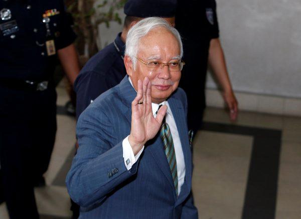 Malaysia's former Prime Minister Najib Razak arrives in court in Kuala Lumpur, Malaysia, on Aug. 8, 2018. (Lai Seng Sin/Reuters)
