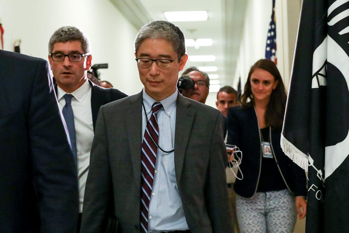 Bruce Ohr (C), a Justice Department official demoted from the posts of an associate deputy attorney general and director of the Organized Crime Drug Enforcement Task Force, leaves for a lunch break from a closed hearing with the House Judiciary and House Oversight and Government Reform committees on Capitol Hill on Aug. 28, 2018. (Samira Bouaou/The Epoch Times)