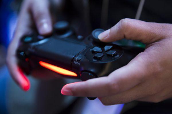 The new sensor bracelets could allow individuals living with hand impairment to use computers and play video games easily. (Tomohiro Ohsumi/Getty Images)