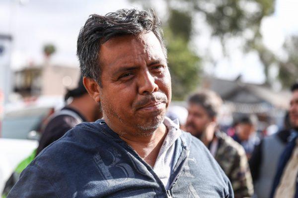 Pueblo Sin Fronteras director Irineo Mujica talks to reporters outside the near-empty migrant camp at the Benito Juarez sports complex near the U.S. border in Tijuana, Mexico, on Dec. 1, 2018. (Charlotte Cuthbertson/The Epoch Times)