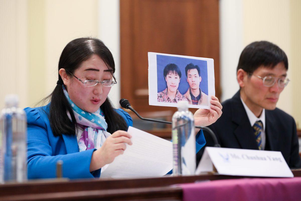 Yang Chunhua, who was tortured in China for her belief in Falun Gong, whose sister and mother died from torture, and whose father died of sorrow, speaks at the "Deteriorating Human Rights and Tuidang Movement in China" forum at Congress in Washington on Dec. 4, 2018. (Samira Bouaou/The Epoch Times)