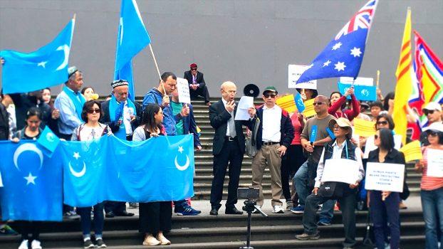 Omer Kanat, from the World Uyghur Congress, speaks at a Human Rights Walk rally in Melbourne, Australia on Dec. 9, 2018. Omer Kanat is calling on the Australian Government to demand the Chinese Regime stop the ongoing repression in East Turkistan/Xinjiang Province. (Rita Li/Epoch Times)