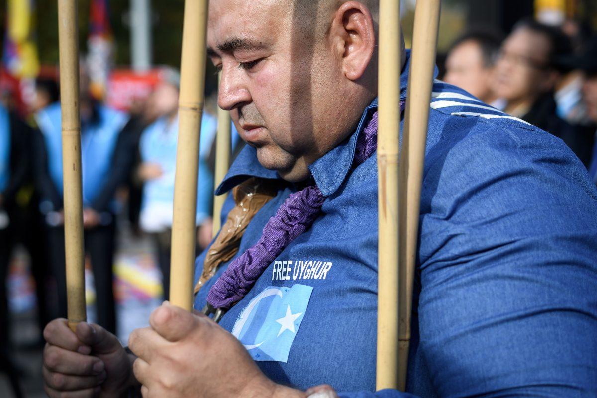 Uyghurs demonstrate against China outside of the United Nations offices during the Universal Periodic Review of China by the U.N. Human Rights Council in Geneva on Nov. 6, 2018. (Fabrice Coffrini/AFP/Getty Images)