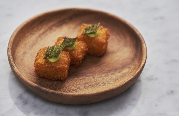 Fried potatoes with bay leaf and nori. A crispy amuse bouche with a subtle nori flavor and crunch. (Courtesy of Oxalis)