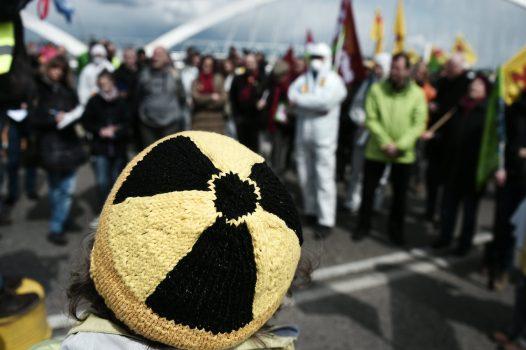 File photo showing an activist wearing a beanie with a “radiation” symbol at a demonstration in France on April 24, 2016. (Frederick Florin/AFP/Getty Images)