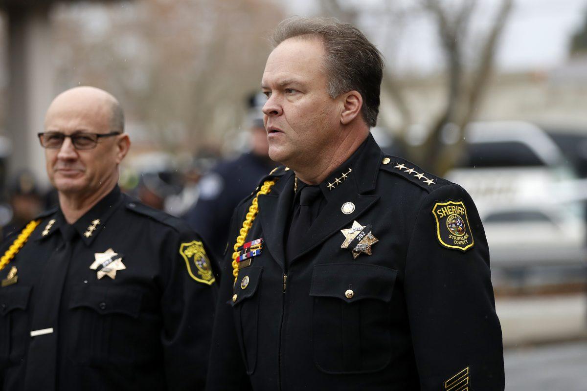 Stanislaus County Sheriff Adam Christianson (R) stands outside CrossPoint Community Church after a funeral service for slain Newman police officer Corporal Ronil Singh in Modesto, California, on Jan. 5, 2019. (Stephen Lam/Getty Images)