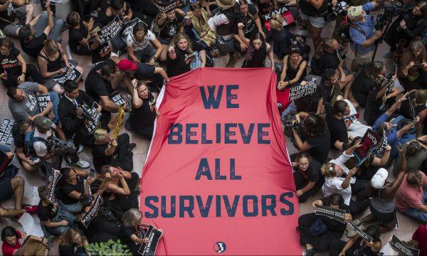 Protestors rally against Supreme Court nominee Judge Brett Kavanaugh in the atrium of the Hart Senate Office Building on Capitol Hill in Washington on Oct. 4, 2018. (Drew Angerer/Getty Images)