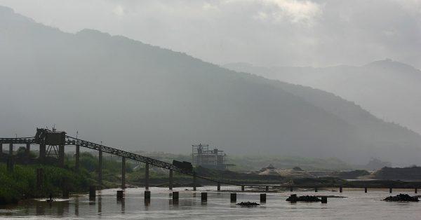 A factory is seen on the bank of the Lancang-Mekong River on July 6, 2005 in Yunnan Province, China. (Guang Niu/Getty Images)