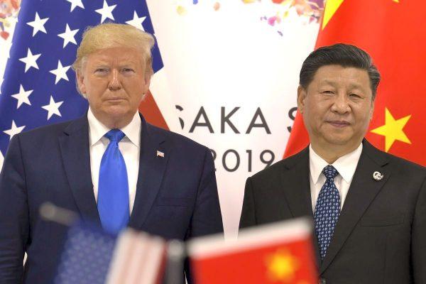 U.S. President Donald Trump (L) with Chinese leader Xi Jinping during a meeting on the sidelines of the G20 summit in Osaka, Japan, on June 29, 2019. (Susan Walsh/AP)