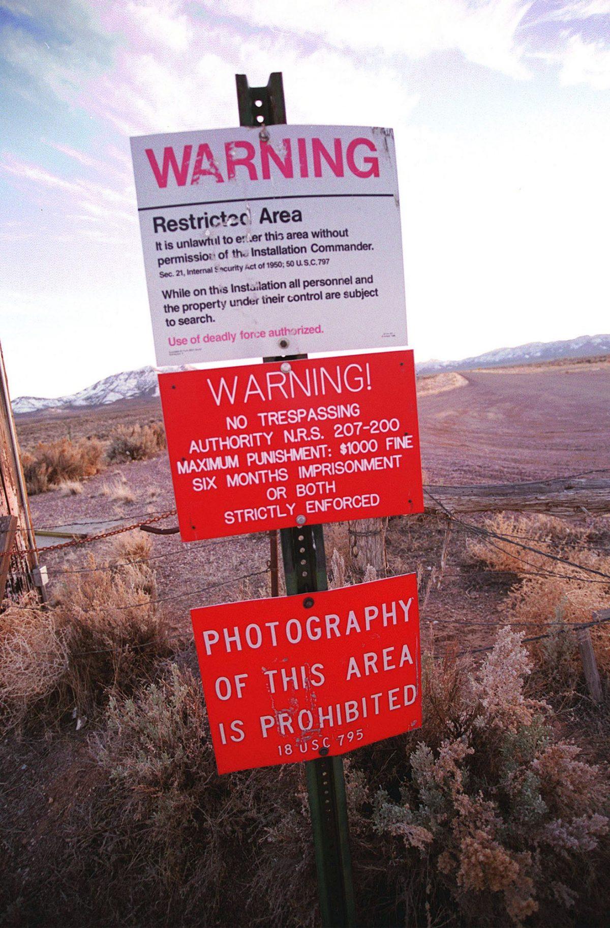 This photo taken on March 12, 2000, shows a warning sign marking the boundary of Area 51, in Rachel, Nev. (Dan Callister/Getty Images)
