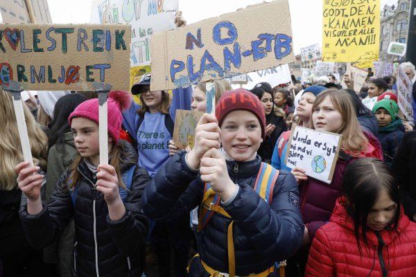 Elementary, high school and college students gather in front of the Parliament building in Oslo on March 22, 2019, to rally for the climate and against politicians who they dont think are doing enough to halt climate change. (TOM HANSEN/AFP/Getty Images)