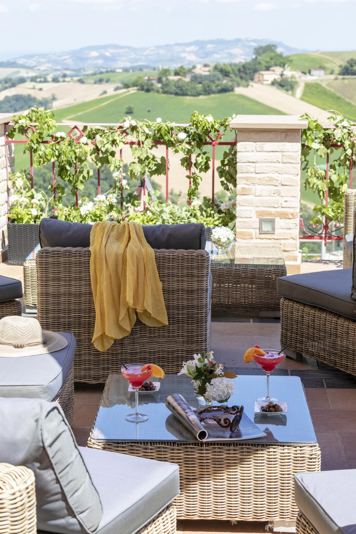 The terrace extending from Hotel Leone's bar affords breathtaking views of Le Marche's rolling green hills. (Courtesy of Hotel Leone)