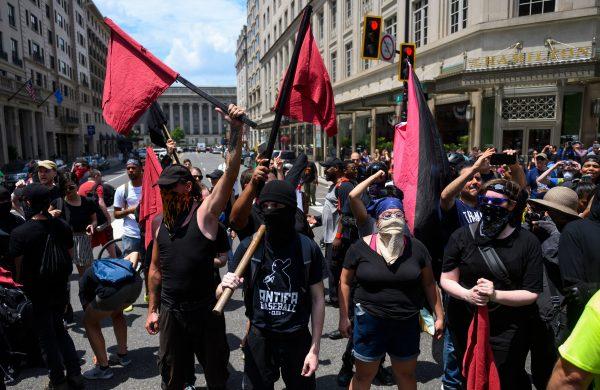 Members of an anti-fascist or Antifa group march as the Alt-Right movement gathers for a "Demand Free Speech" rally in Washington, on July 6, 2019. (Andrew Caballero-Reynolds//AFP/Getty Images)