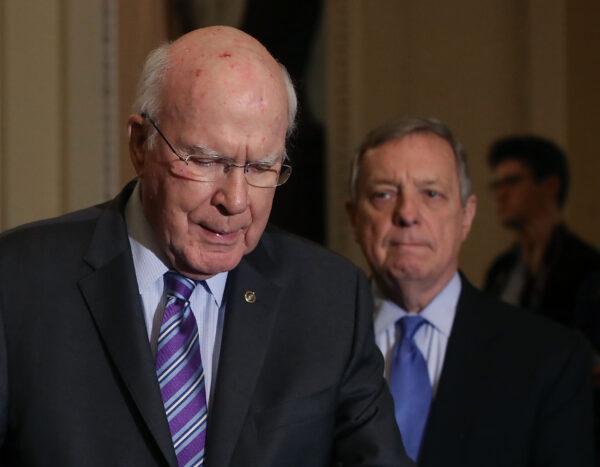 Sen. Patrick Leahy (D-Vt.) speaks at a press conference as Sen. Richard Durbin (D-Ill.) listens, in Washington on Feb. 12, 2019. (Photo by Mark Wilson/Getty Images)