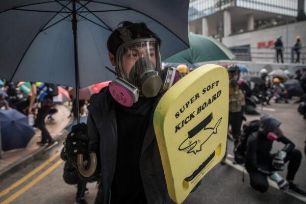 Pro-democracy protesters clash with police during a march in Hong Kong, on Sept. 29, 2019. (Chris McGrath/Getty Images)