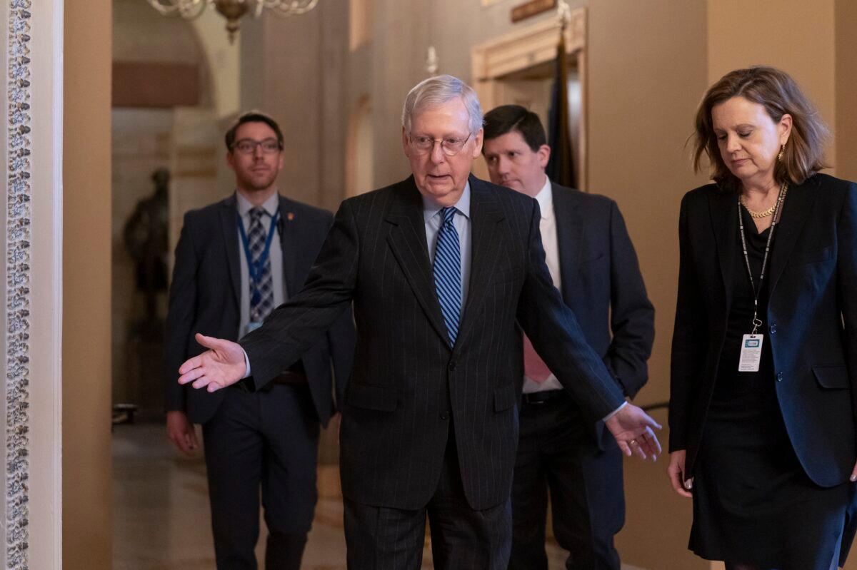 Senate Majority Leader Mitch McConnell (R-Ky.) arrives for a closed meeting with fellow Republicans as he strategizes about the looming impeachment trial of President Donald Trump, at the Capitol in Washington on Jan. 7, 2020. (J. Scott Applewhite/AP Photo)