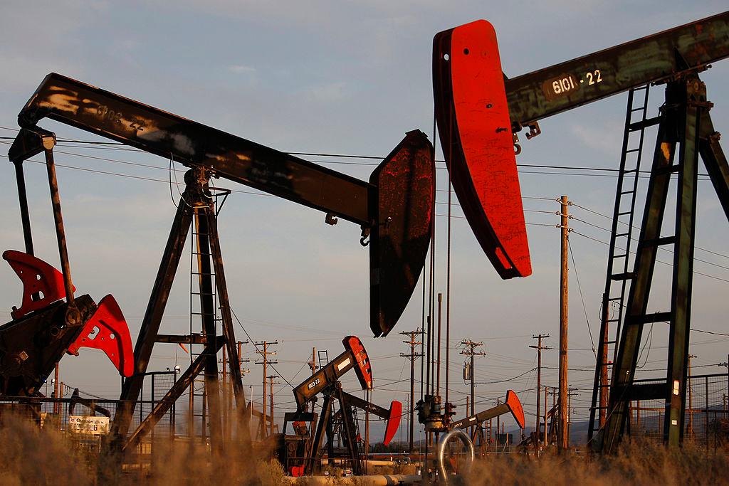 Pump jacks and wells are seen in an oil field on the Monterey Shale formation where hydraulic fracturing, or fracking, is used to extract gas and oil near McKittrick, Calif., on March 23, 2014. (David McNew/Getty Images)