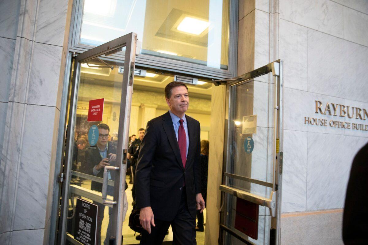 Former FBI Director James Comey leaves the Rayburn House Office Building following a closed House Judiciary Committee meeting to hear his testimony on Capitol Hill in Washington on Dec. 7, 2018. (Alex Edelman / AFP via Getty Images)