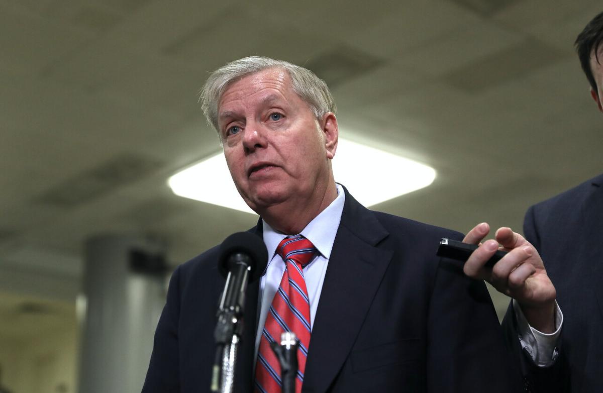 Sen. Lindsey Graham (R-S.C.) speaks to media during a break in impeachment proceedings, in the Senate subway area in the Capitol in Washington on Jan. 28, 2020. (Charlotte Cuthbertson/The Epoch Times)