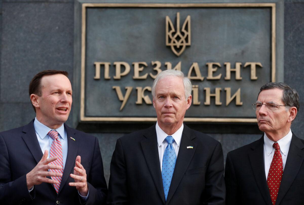 U.S. Sens. Ron Johnson, John Barrasso, and Chris Murphy attend a news briefing following their meeting with Ukrainian President Volodymyr Zelenskiy in Kiev, Ukraine, on Feb. 14, 2020. (Valentyn Ogirenko/Reuters)