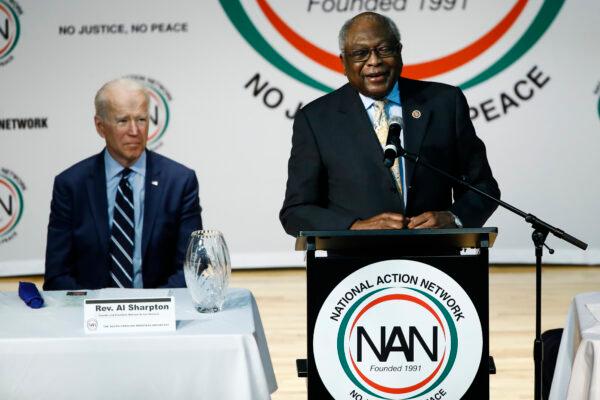 Then-Democratic presidential candidate Joe Biden listens to Rep. James Clyburn (D-S.C.) speak at the National Action Network South Carolina Ministers' Breakfast in North Charleston, S.C. on Feb. 26, 2020. (Matt Rourke/AP Photo)