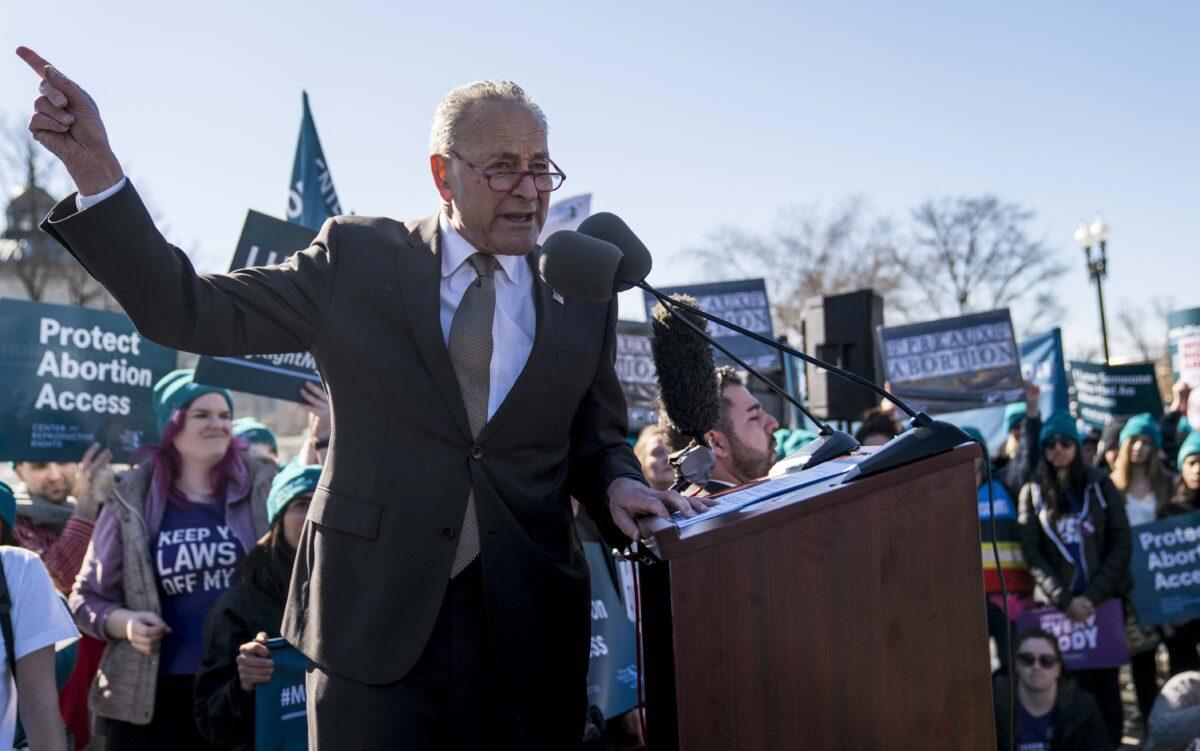Senate Minority Leader Sen. Chuck Schumer (D-N.Y.) speaks at an abortion rights rally outside of the Supreme Court as the justices hear oral arguments in the June Medical Services v. Russo case in Washington on March 4, 2020. (Sarah Silbiger/Getty Images)