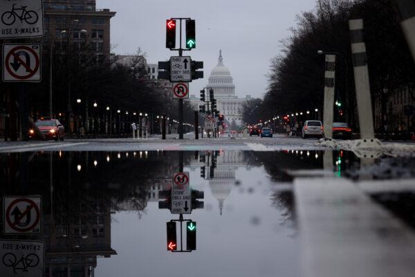 Pennsylvania Avenue, normally filled with commuters during morning rush hour, is shown nearly empty due to the impacts of COVID-19 in Washington on March 19, 2020. (Win McNamee/Getty Images)