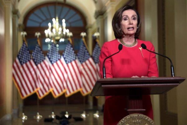 Speaker of the House Rep. Nancy Pelosi (D-Calif.) delivers a statement at the hallway of the Speaker’s Balcony at the U.S. Capitol in Washington, on March 23, 2020. (Alex Wong/Getty Images)