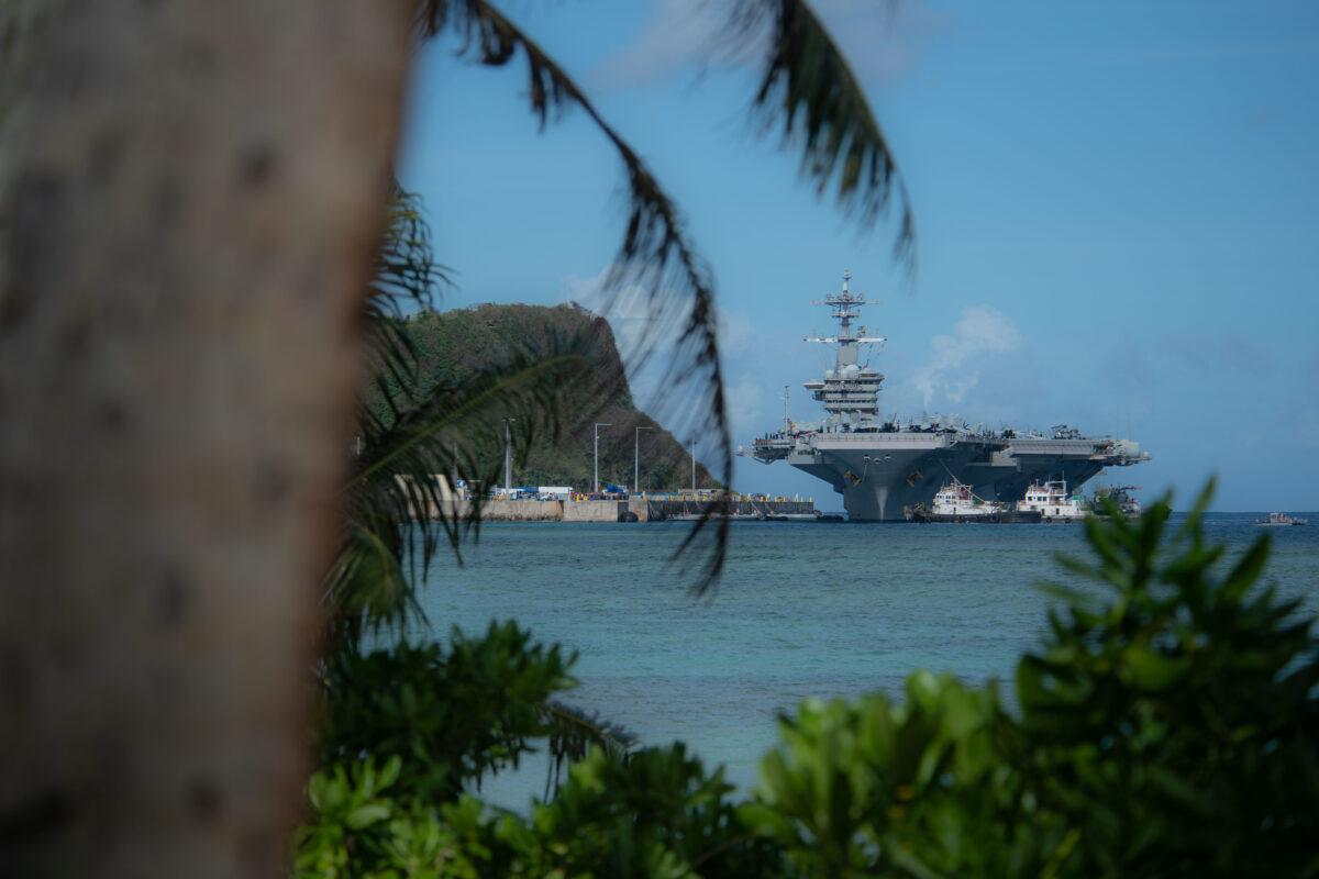 The aircraft carrier Theodore Roosevelt (CVN 71) transits Apra Harbor as the ship prepares to moor in Guam on Feb. 7, 2019. (U.S. Navy photo by Mass Communication Specialist 3rd Class Terence Deleon Guerrero)