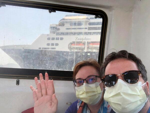 Laura Gabaroni and her husband Juan Huergo take a selfie on board a tender after they were evacuated from the Zaandam, a Holland American cruise ship, near the Panama Canal, on March 28, 2020. (Juan Huergo via AP)