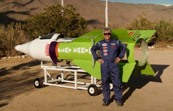 Mike Hughes and his rocket painted with the words "Research flat Earth." (Toby Brusseau)