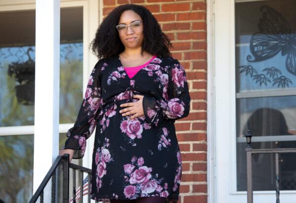 Ashley Esposito, who is pregnant with her first child due in July, stands outside her home in Baltimore, Md., on April 6, 2020. (Saul Loeb/AFP via Getty Images)