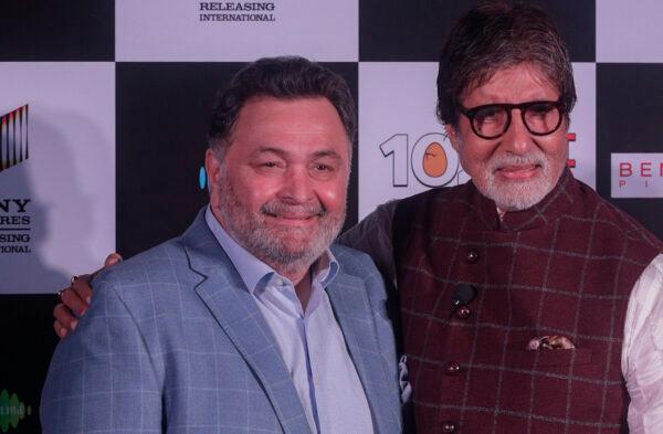Bollywood actor Rishi Kapoor (L) poses with actor Amitabh Bachchan at the launch of film "102 Not Out" in Mumbai, India, on April 19, 2018. (Rafiq Maqbool/File/AP Photo)