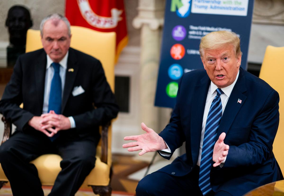 President Donald Trump meets with New Jersey Gov. Phil Murphy, left, in the Oval Office of the White House in Washington on April 30, 2020. (Doug Mills/The New York Times/Pool/Getty Images)
