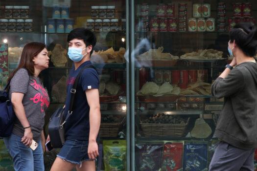 Pedestrians in the Chinatown district on March 04, 2020, in Sydney, Australia. (Lisa Maree Williams/Getty Images)