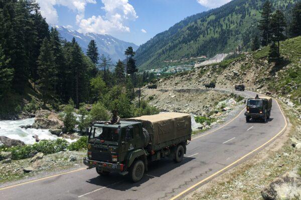 Indian army convoys make their way towards Leh, bordering China, in Gagangir, India, on June 17, 2020. (TAUSEEF MUSTAFA/AFP via Getty Images)