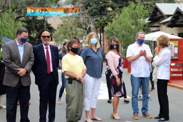 Members of the Laguna Beach City Council gather to celebrate the opening of a summertime shopping promenade to spur business in the heart of the city following the COVID-19 pandemic, in Laguna Beach, Calif., on June 15, 2020. (Jamie Joseph/The Epoch Times)
