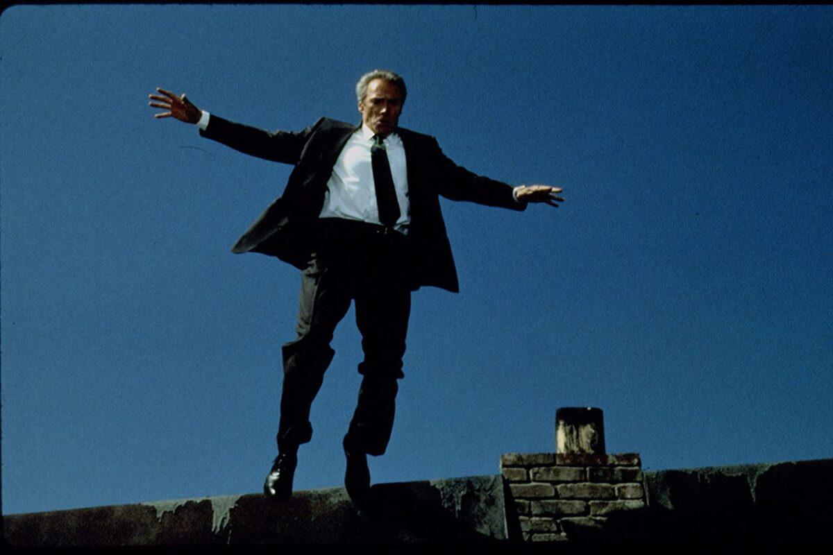 Secret Service agent Frank Horrigan (Clint Eastwood) jumps between buildings in "In the Line of Fire." (Columbia Pictures)