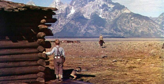 Young Joey Starrett (Brandon De Wilde) watches Shane (Alan Ladd) ride off toward the mountains, in “Shane.” (Paramount Pictures)