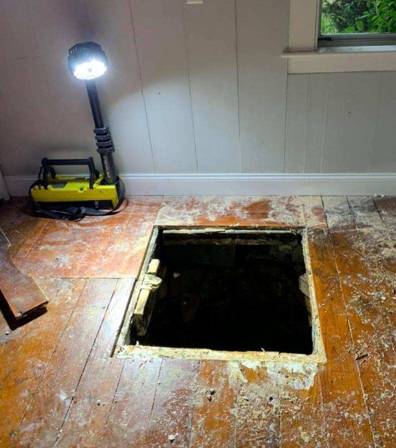 The flooring of a Connecticut home led to a well below. (Courtesy of Guilford Fire Department)