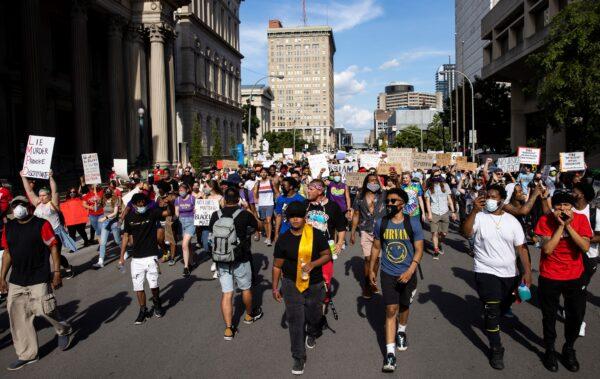 Protesters march through downtown in Louisville, Ky., on June 5, 2020. (Brett Carlsen/Getty Images)