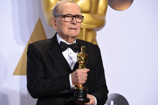 Composer Ennio Morricone poses with the Oscar for Best Original Score, "The Hateful Eight," in the press room during the 88th Oscars in Hollywood on Feb. 28, 2016. (Robyn Beck / AFP via Getty Images)