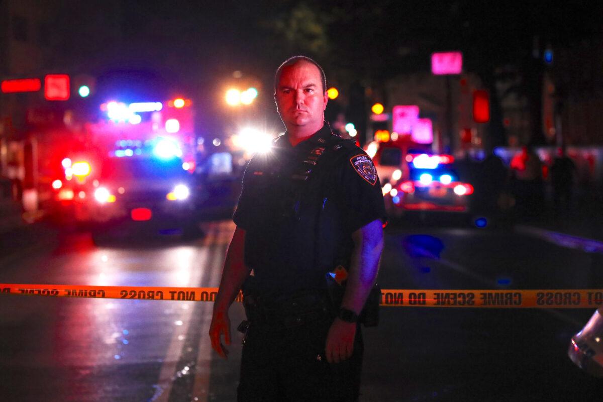 Police gather at the scene where two New York City officers were shot in a confrontation, in New York on June 3, 2020. (Spencer Platt/Getty Images)
