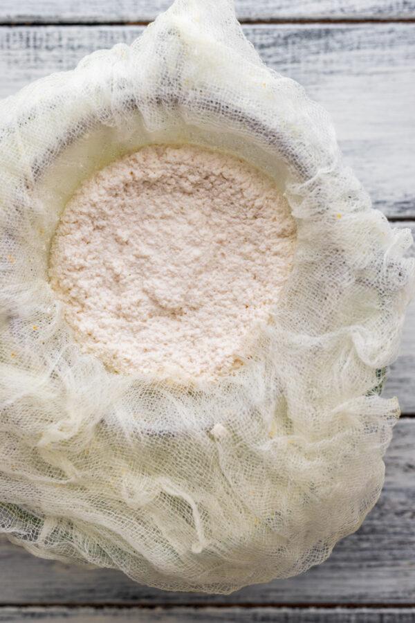 Let the curds and whey drain overnight in the fridge. (Photo by Giulia Scarpaleggia)