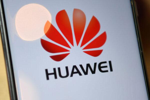 The logo of Chinese company Huawei is seen on the screen of a Huawei mobile phone in London on July 14, 2020. (Daniel Leal-Olivas/AFP via Getty Images)