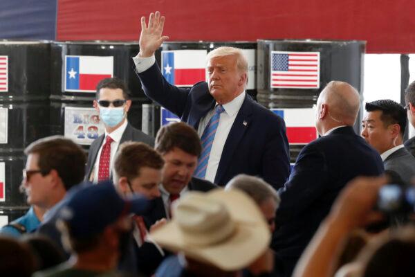 President Donald Trump waves to supporters after delivering remarks about American energy production during a visit to the Double Eagle Development oil rig, in Midland, Texas, on July 29, 2020. (Tony Gutierrez/AP Photo)