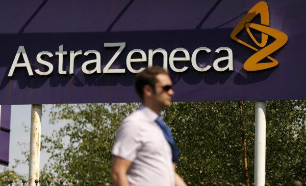 A man walks past a sign at an AstraZeneca site in Macclesfield, central England, on May 19, 2014. (Phil Noble/File Photo/Reuters)