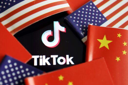 China and U.S. flags are seen near a TikTok logo in this illustration picture taken July 16, 2020. (Florence Lo/File Photo/Reuters)