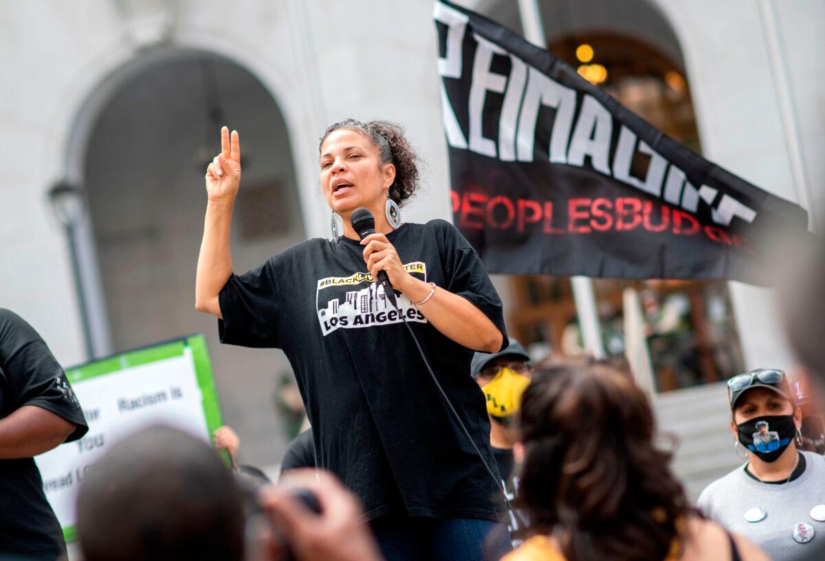 Melina Abdullah from Black Lives Matter addresses a demonstration calling for the removal of District Attorney Jackie Lacey in Los Angeles, Calif., on June 17, 2020. (Valerie Macon/AFP via Getty Images)
