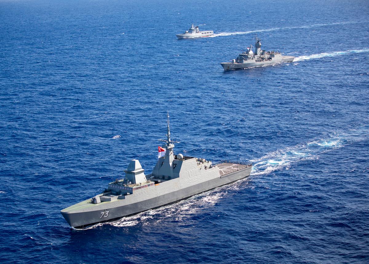 Her Majesty's Australian Ship Stuart sails in company with the Republic of Singapore Ship Supreme and Kapal Diraja Brunei (Royal Brunei Ship) Daruleshan through the Pacific Ocean as they prepare to take part in Exercise Rim of the Pacific 2020 on Aug. 17, 2020 (Australian Department of Defence)